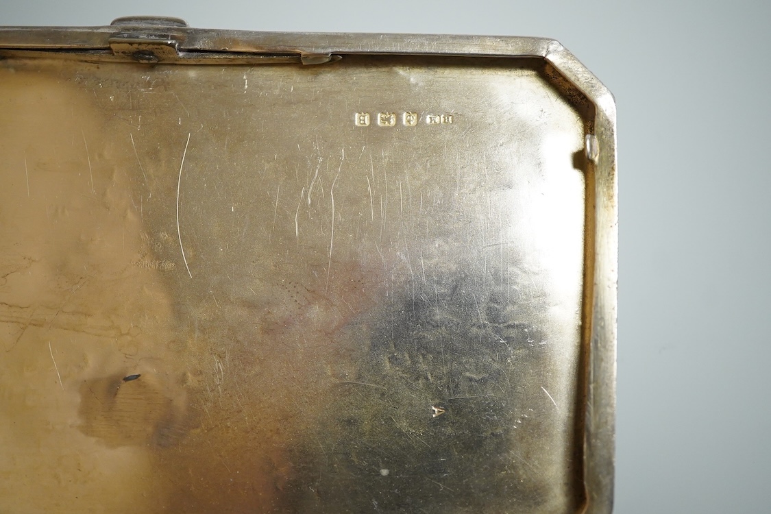 A George V silver rectangular cigarette case, with canted corners, Henry Matthews, Birmingham, 1926, 14.3cm, 6oz.